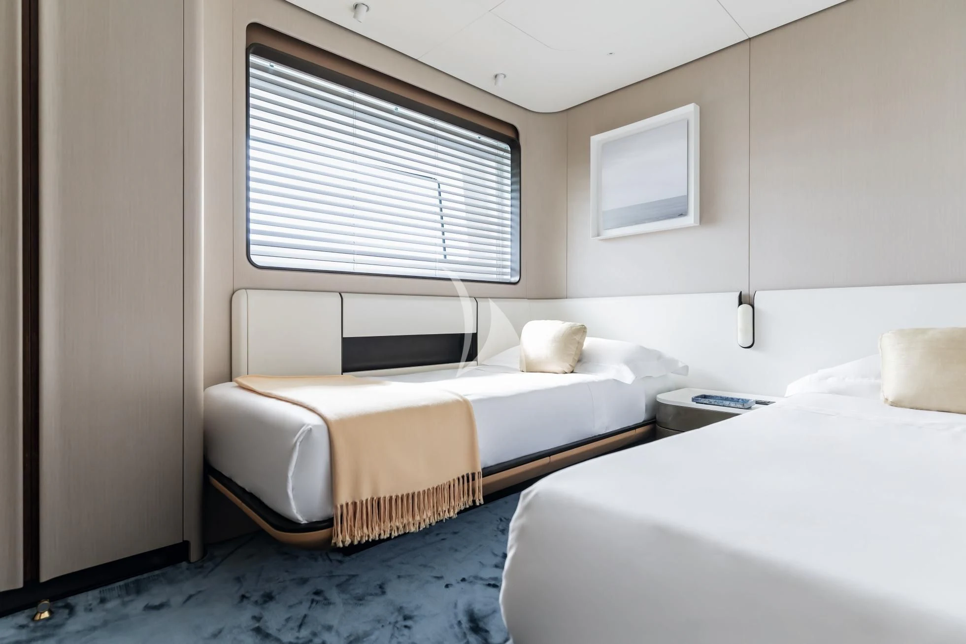 a couple of beds in a room aboard LUZ DE MAR Yacht for Sale