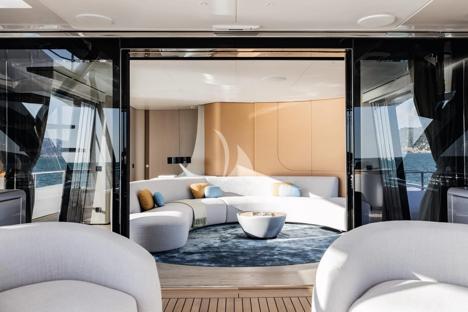 a room with a table and chairs aboard LUZ DE MAR Yacht for Sale