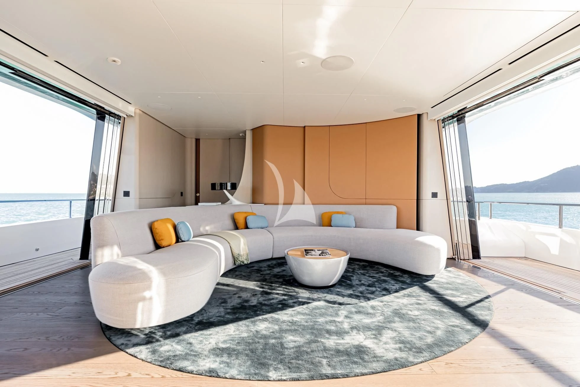 a modern kitchen with white cabinets aboard LUZ DE MAR Yacht for Sale