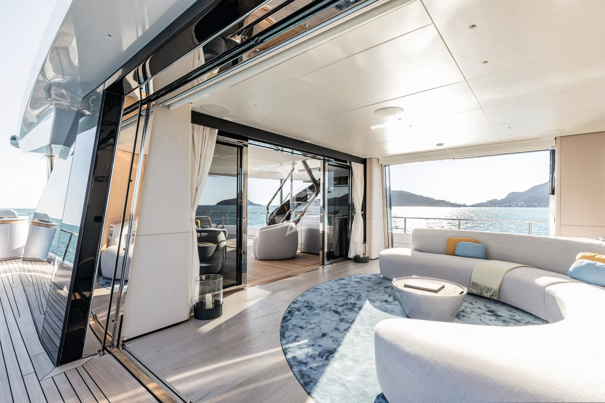 a modern looking living room aboard LUZ DE MAR Yacht for Sale