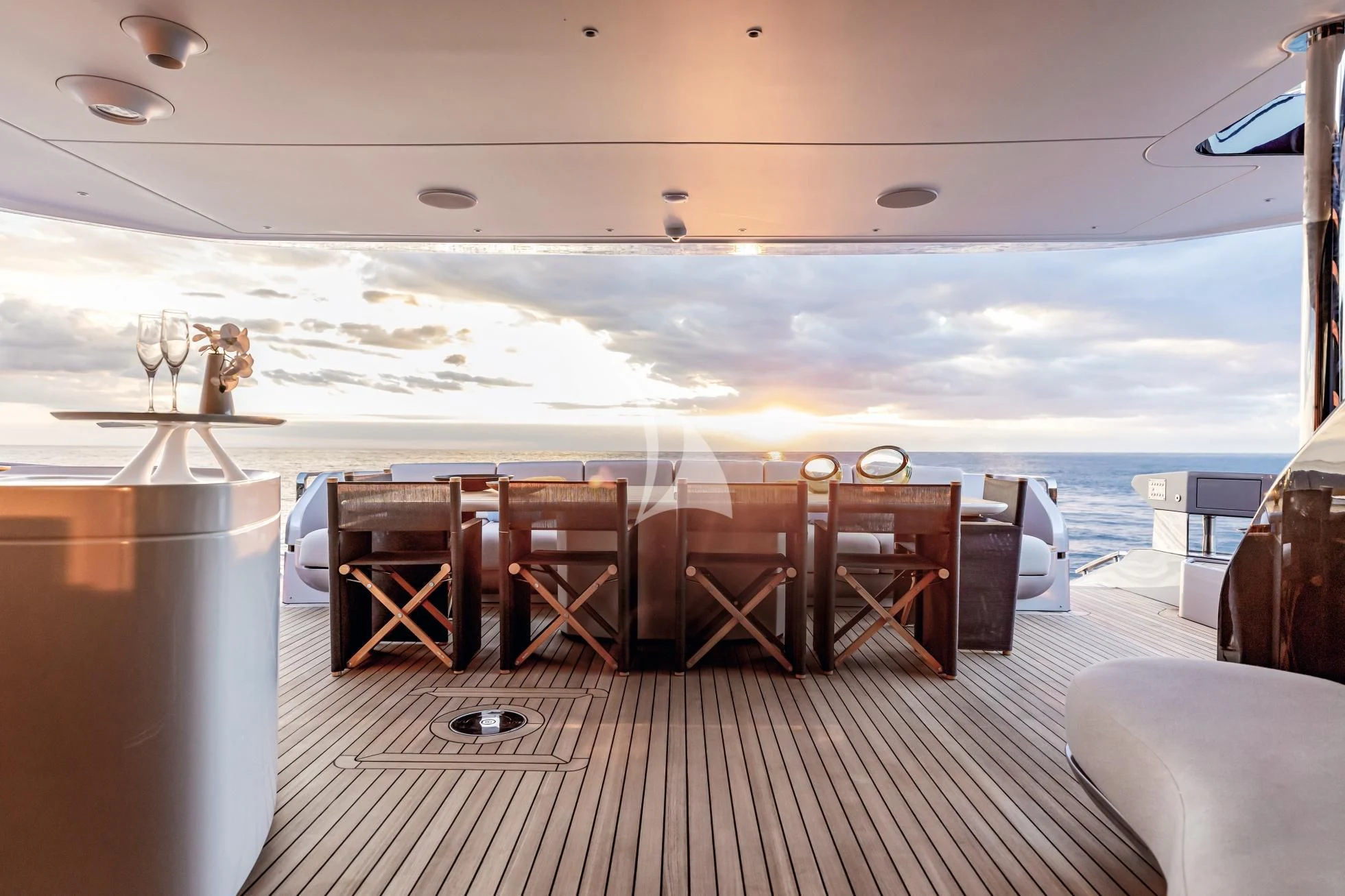 a deck with chairs and a large body of water aboard LUZ DE MAR Yacht for Sale
