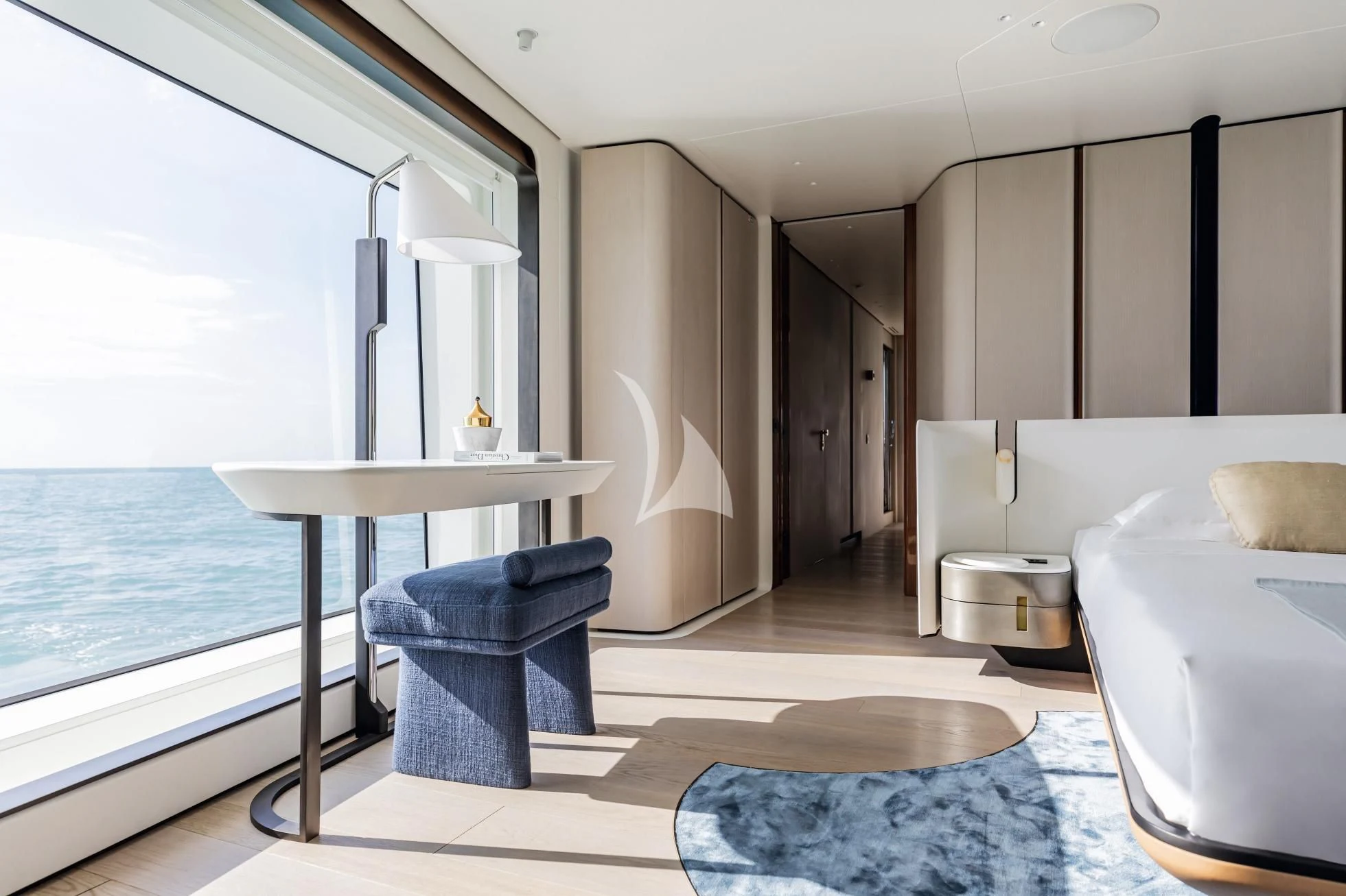 a room with a table and a couch aboard LUZ DE MAR Yacht for Sale