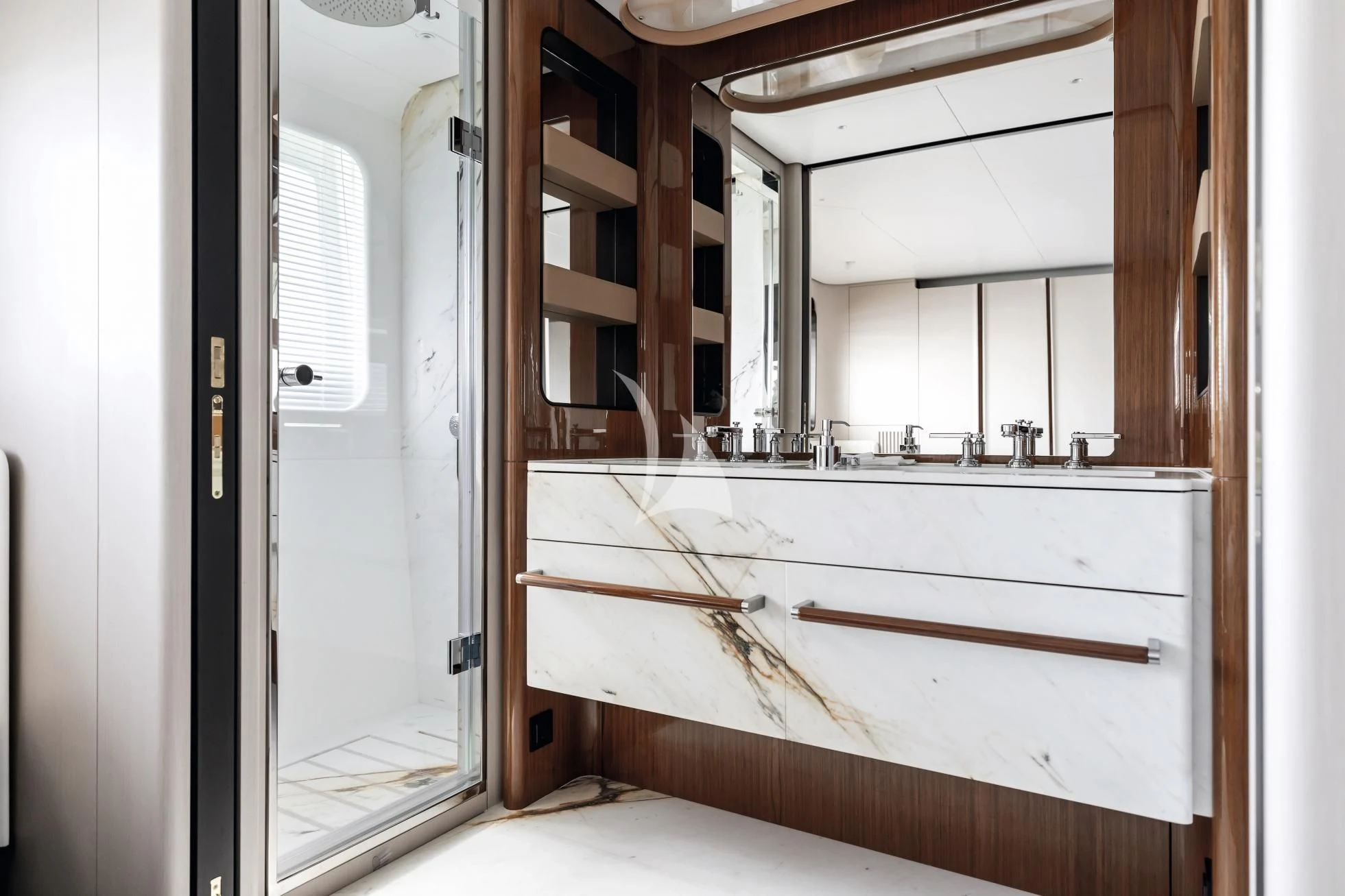 a bathroom with a sink and a mirror aboard LUZ DE MAR Yacht for Sale