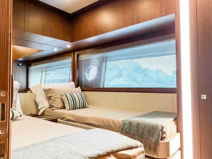 a room with two beds aboard EVENFLOW Yacht for Sale