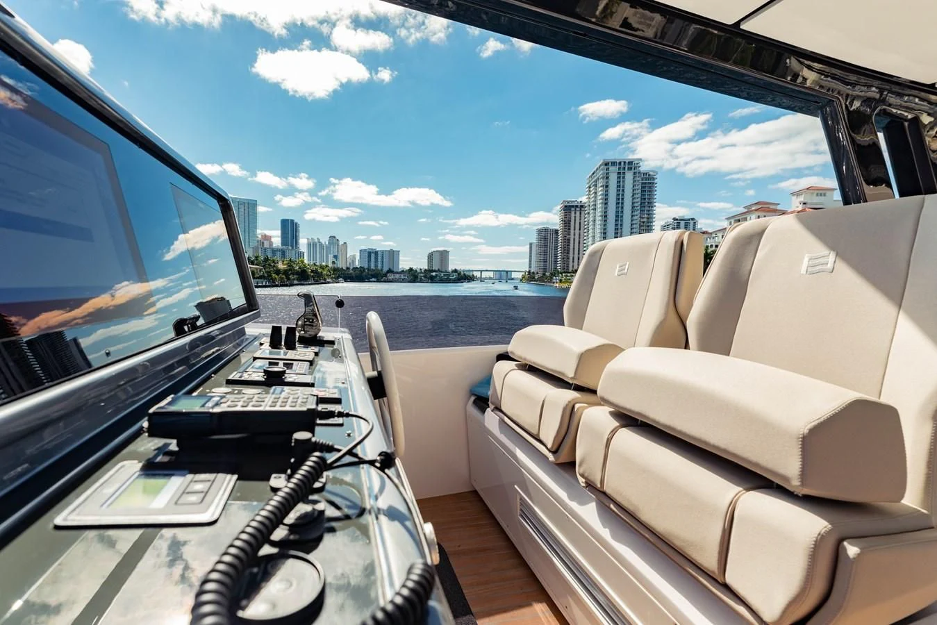 a car with a view of a city and water aboard VITTORIA Yacht for Sale