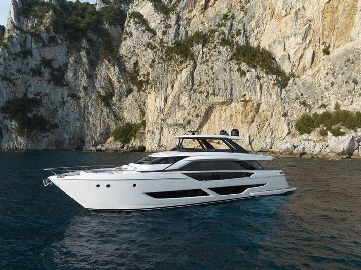 a white boat in the water aboard VITTORIA Yacht for Sale