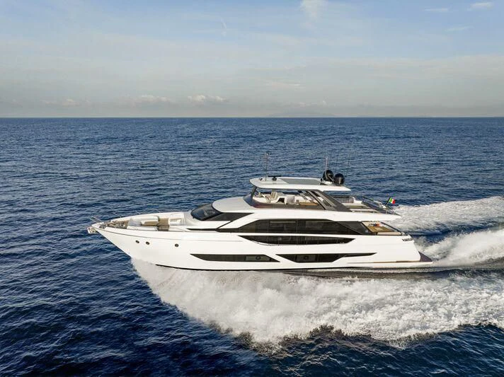 a white yacht on the water aboard VITTORIA Yacht for Sale