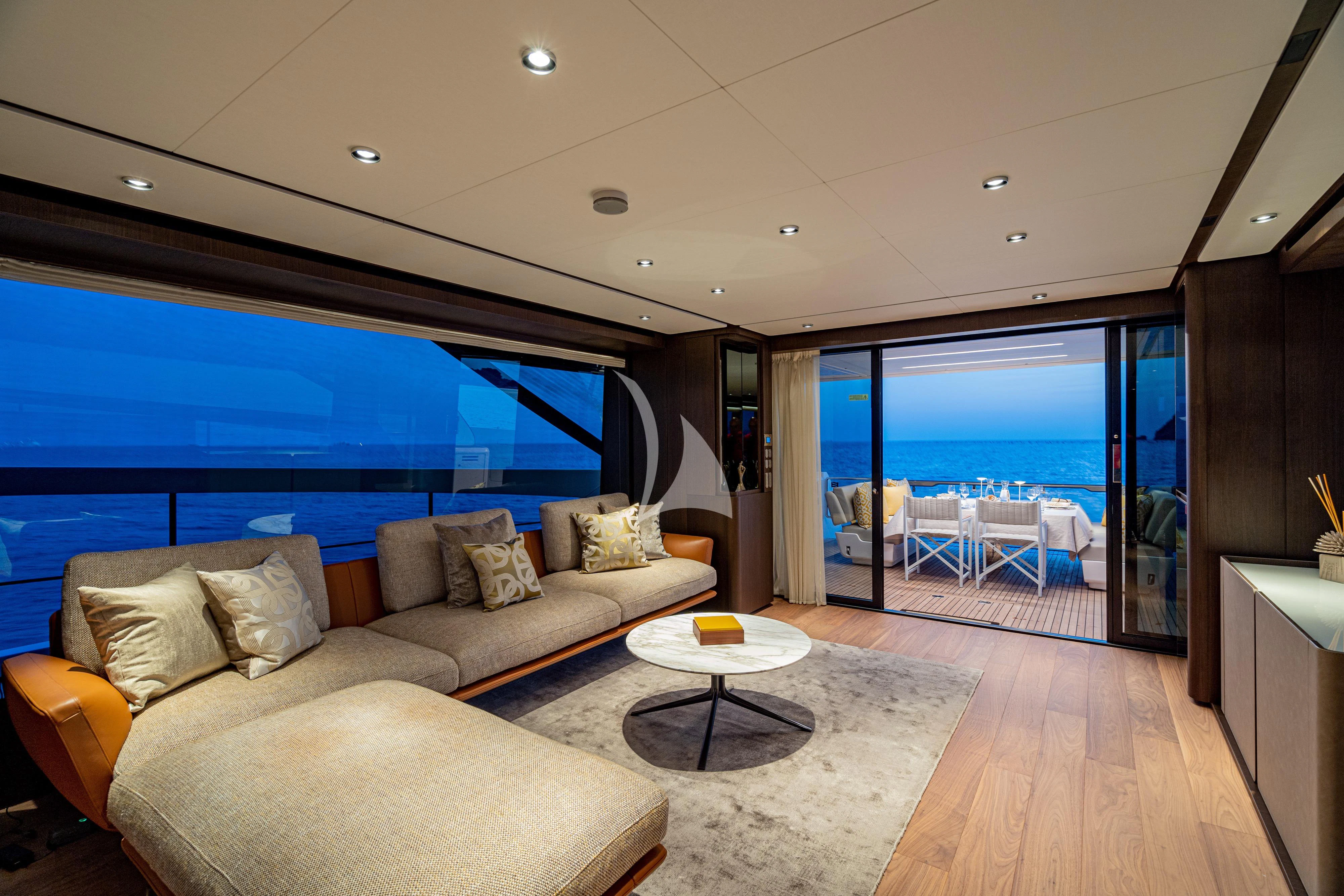 a living room with a large window aboard VITTORIA Yacht for Sale