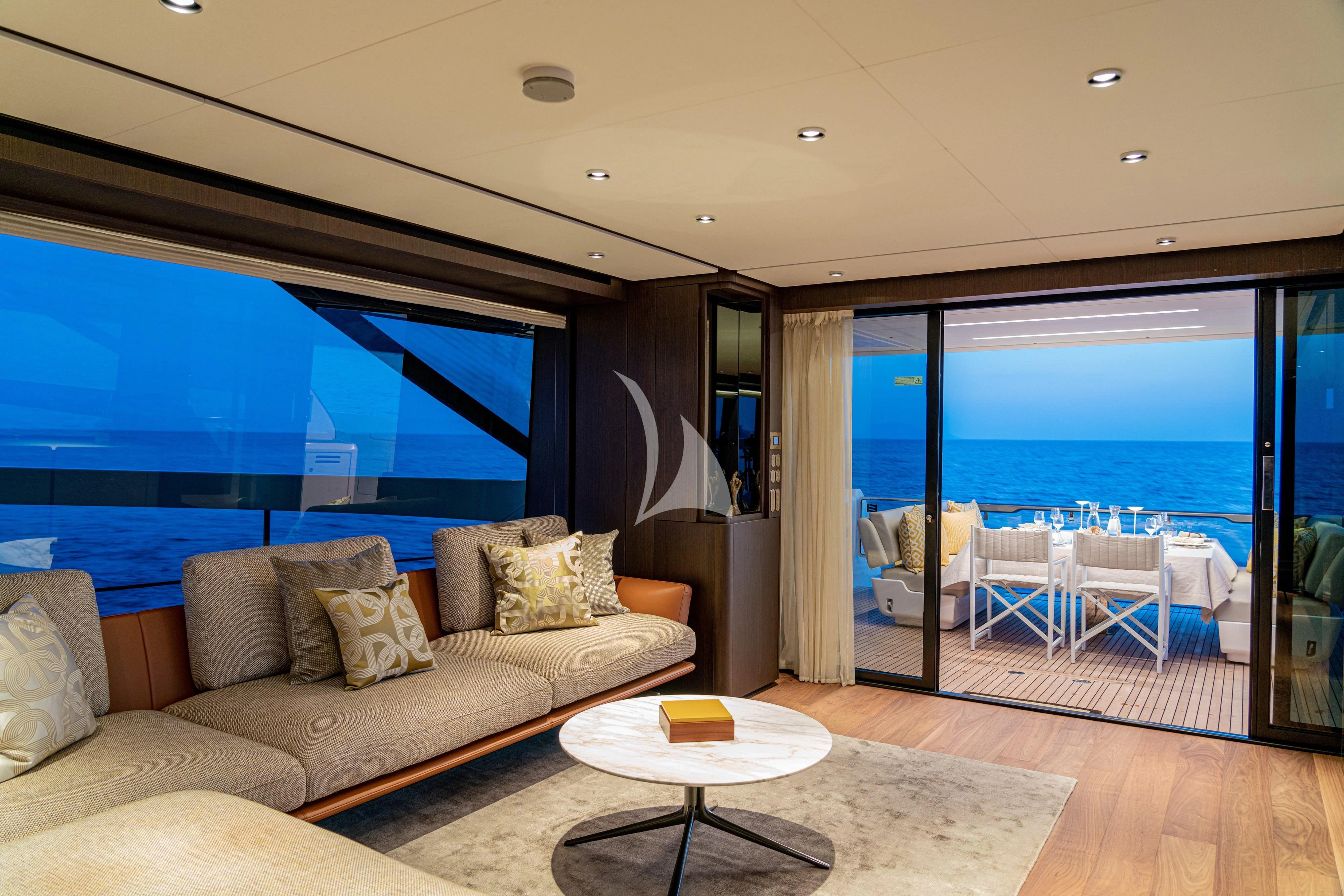 a living room with a large window aboard VITTORIA Yacht for Sale