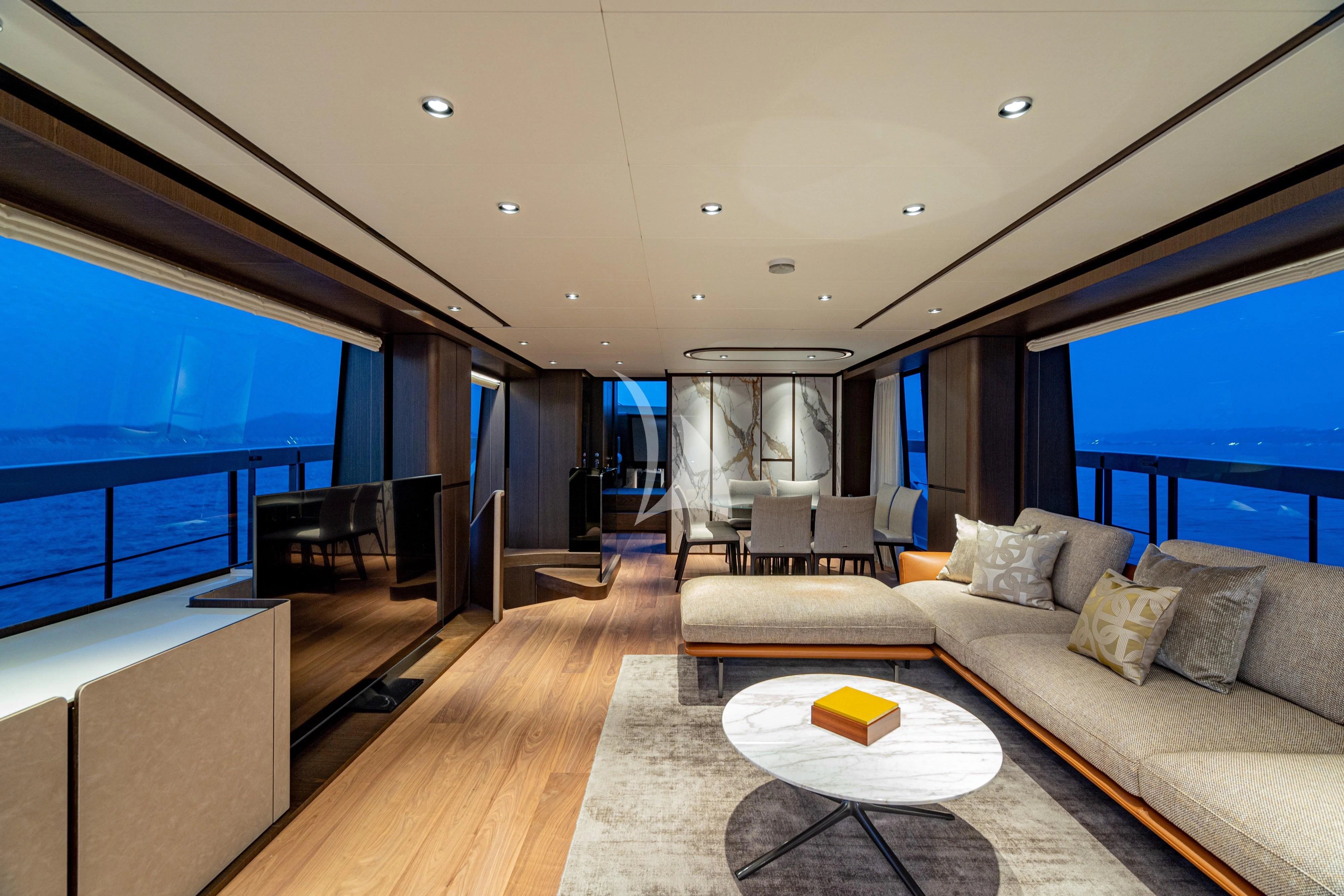 a living room with a large window aboard VITTORIA Yacht for Sale