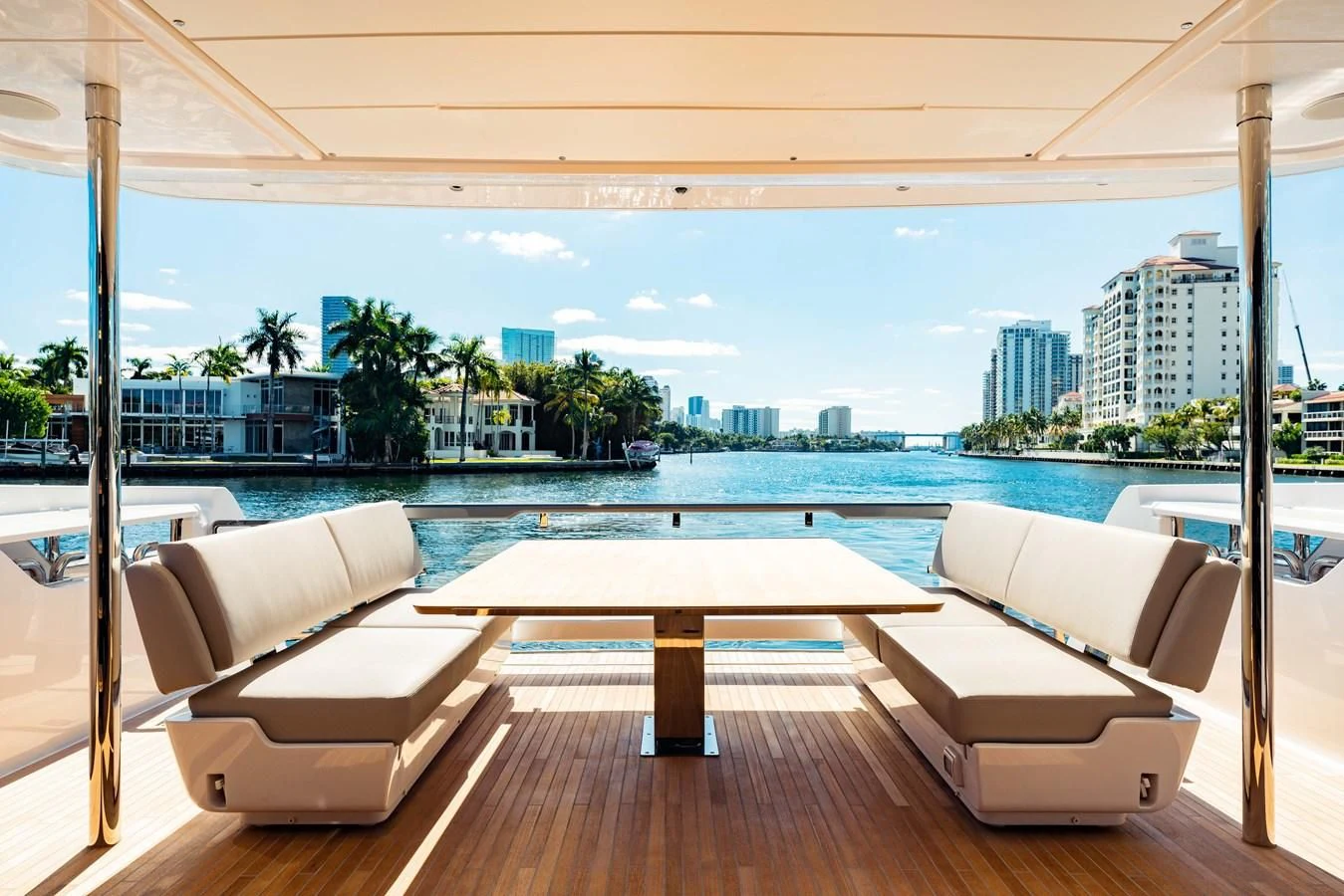a room with a pool and a city in the background aboard VITTORIA Yacht for Sale