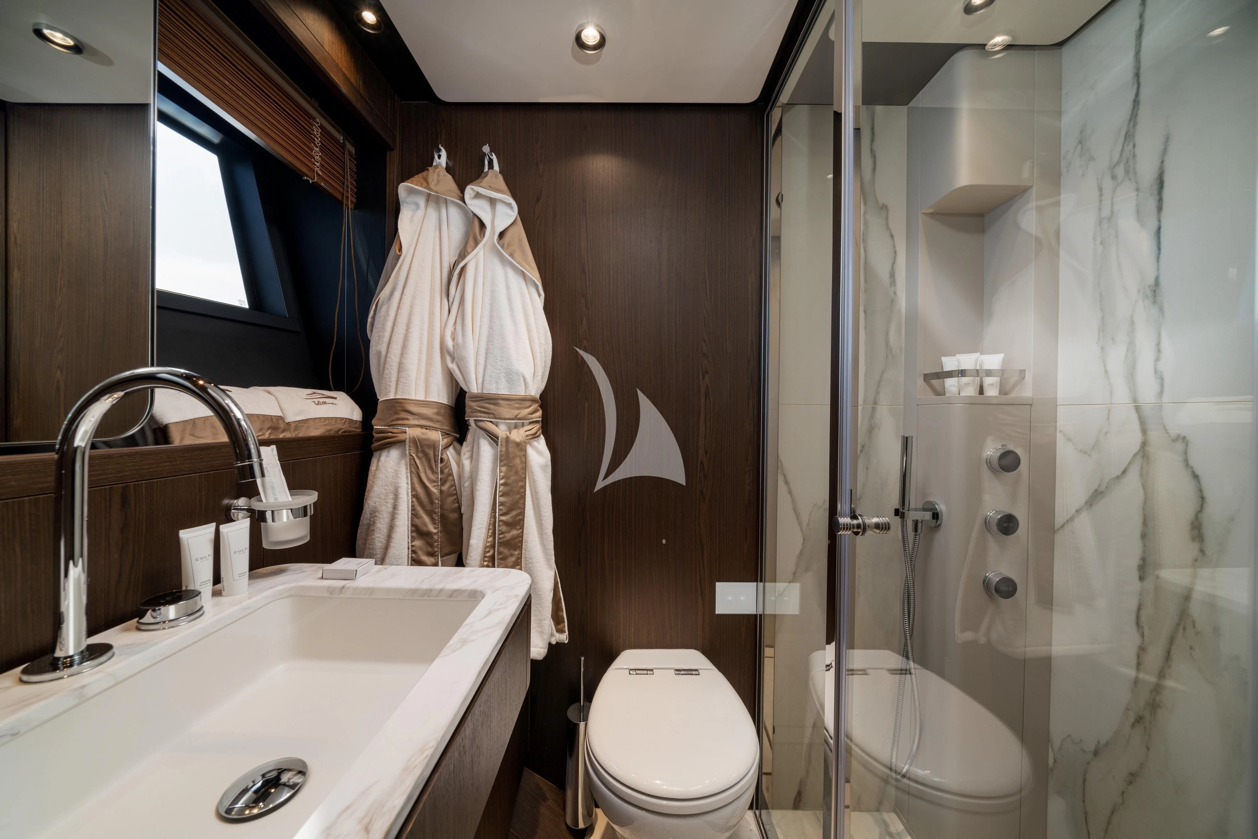 a bathroom with a standup shower aboard VITTORIA Yacht for Sale