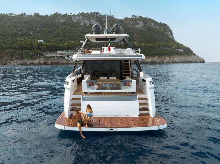 a boat with a couple of people on it aboard VITTORIA Yacht for Sale