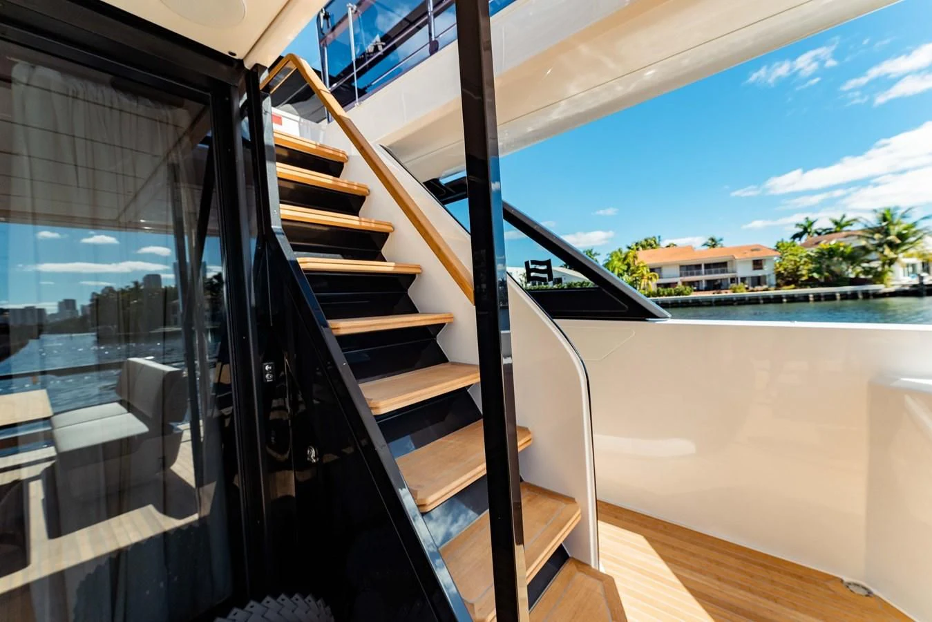 a set of stairs leading to a balcony aboard VITTORIA Yacht for Sale