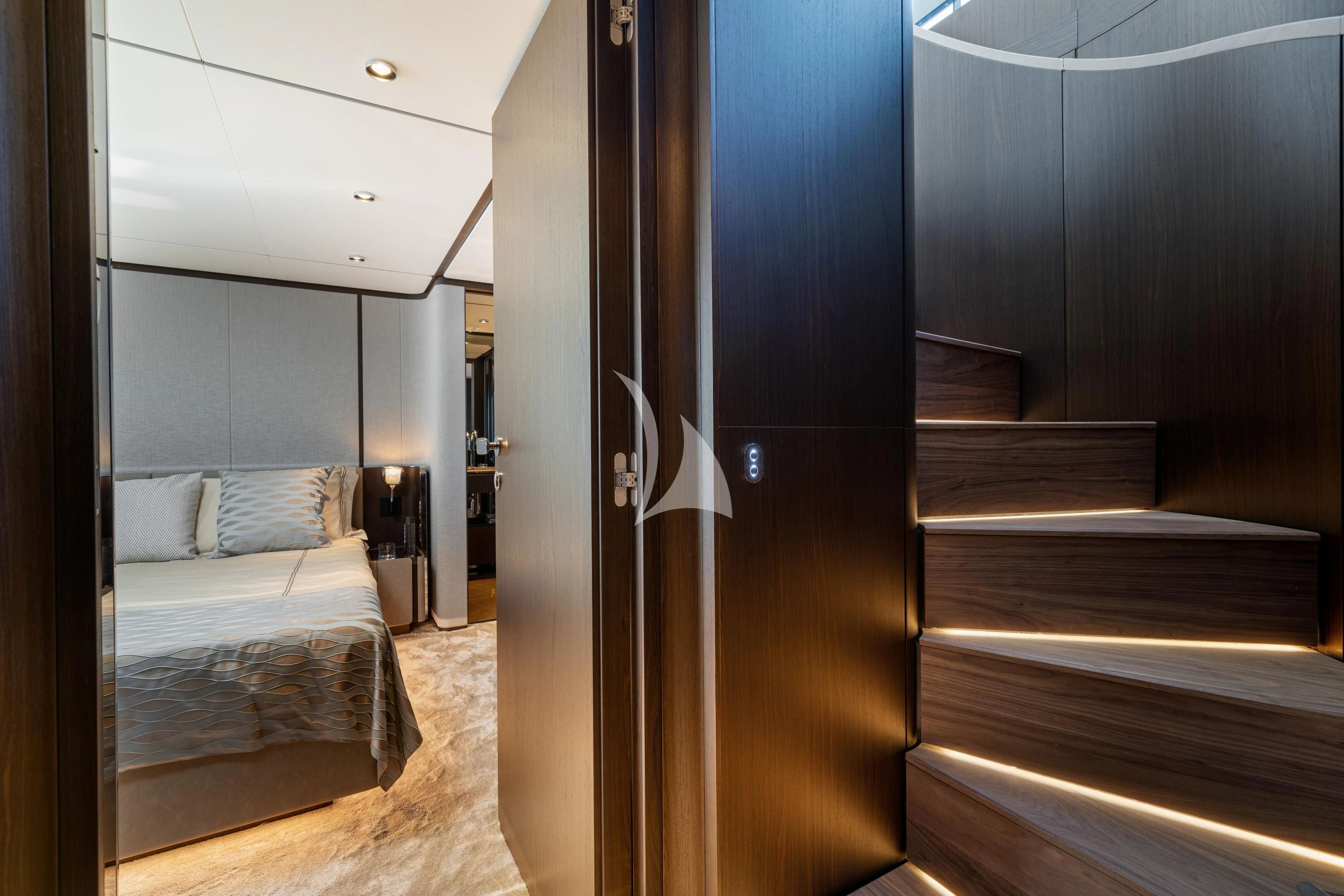 a room with a bed and a closet aboard VITTORIA Yacht for Sale