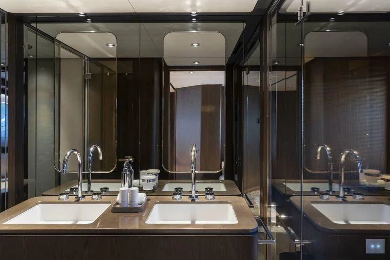 a bathroom with sinks and mirrors aboard VITTORIA Yacht for Sale