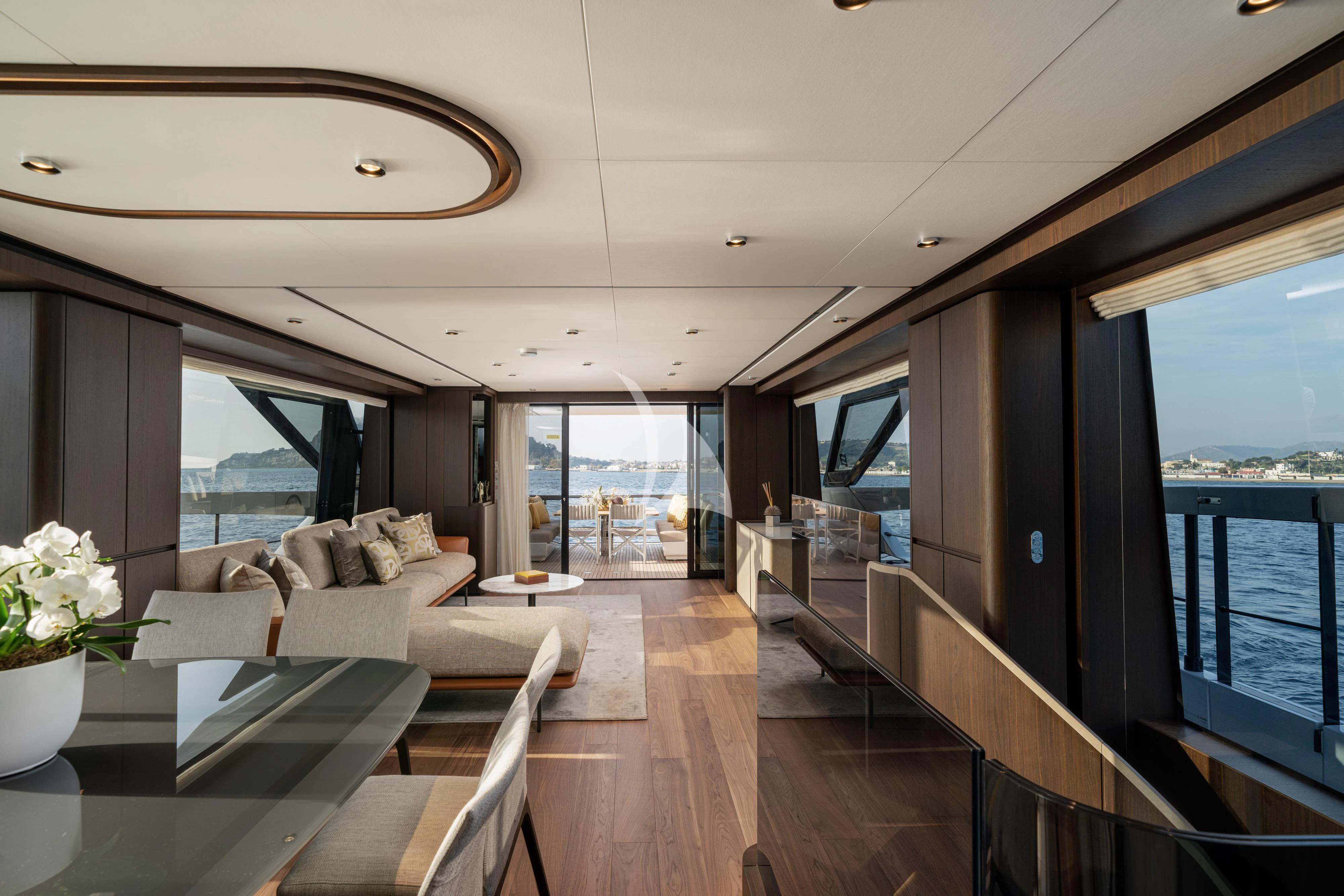a living room with a large window aboard VITTORIA Yacht for Sale
