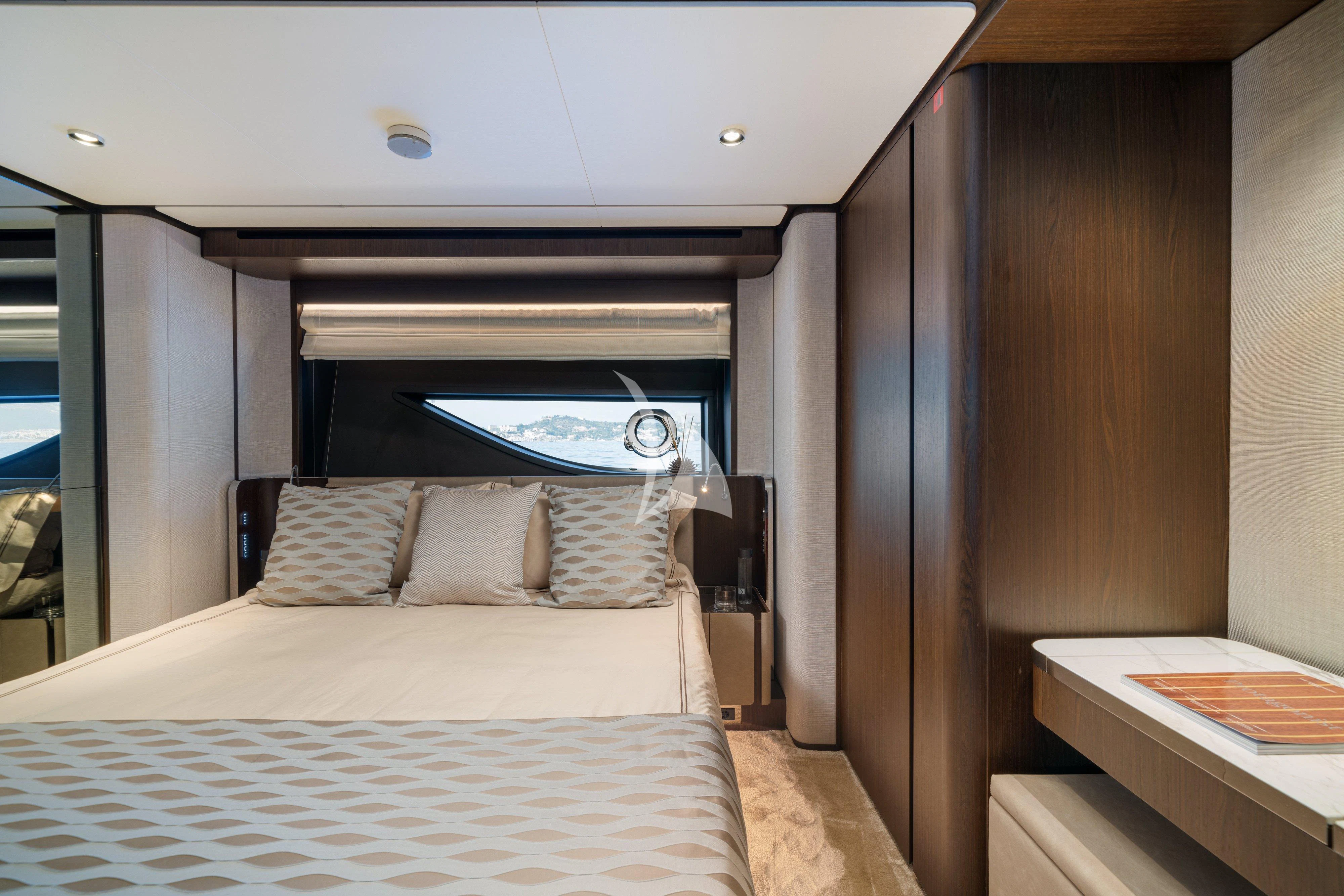 a bed with a white bed spread aboard VITTORIA Yacht for Sale