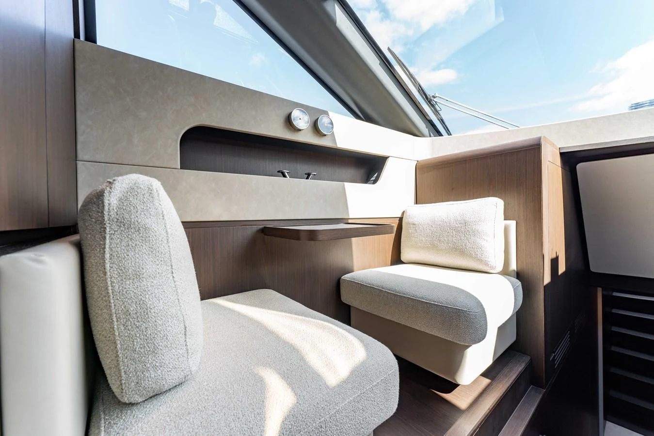 a room with a couch and a window aboard VITTORIA Yacht for Sale