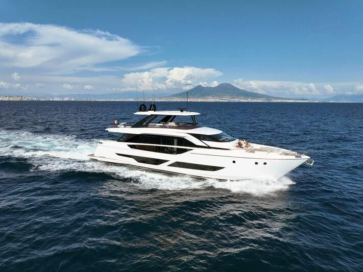 a white boat in the water aboard VITTORIA Yacht for Sale