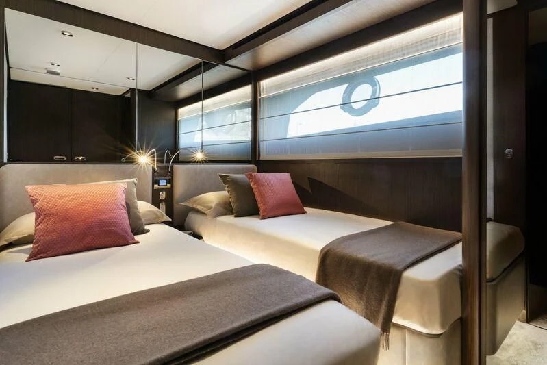 a room with two beds aboard VITTORIA Yacht for Sale