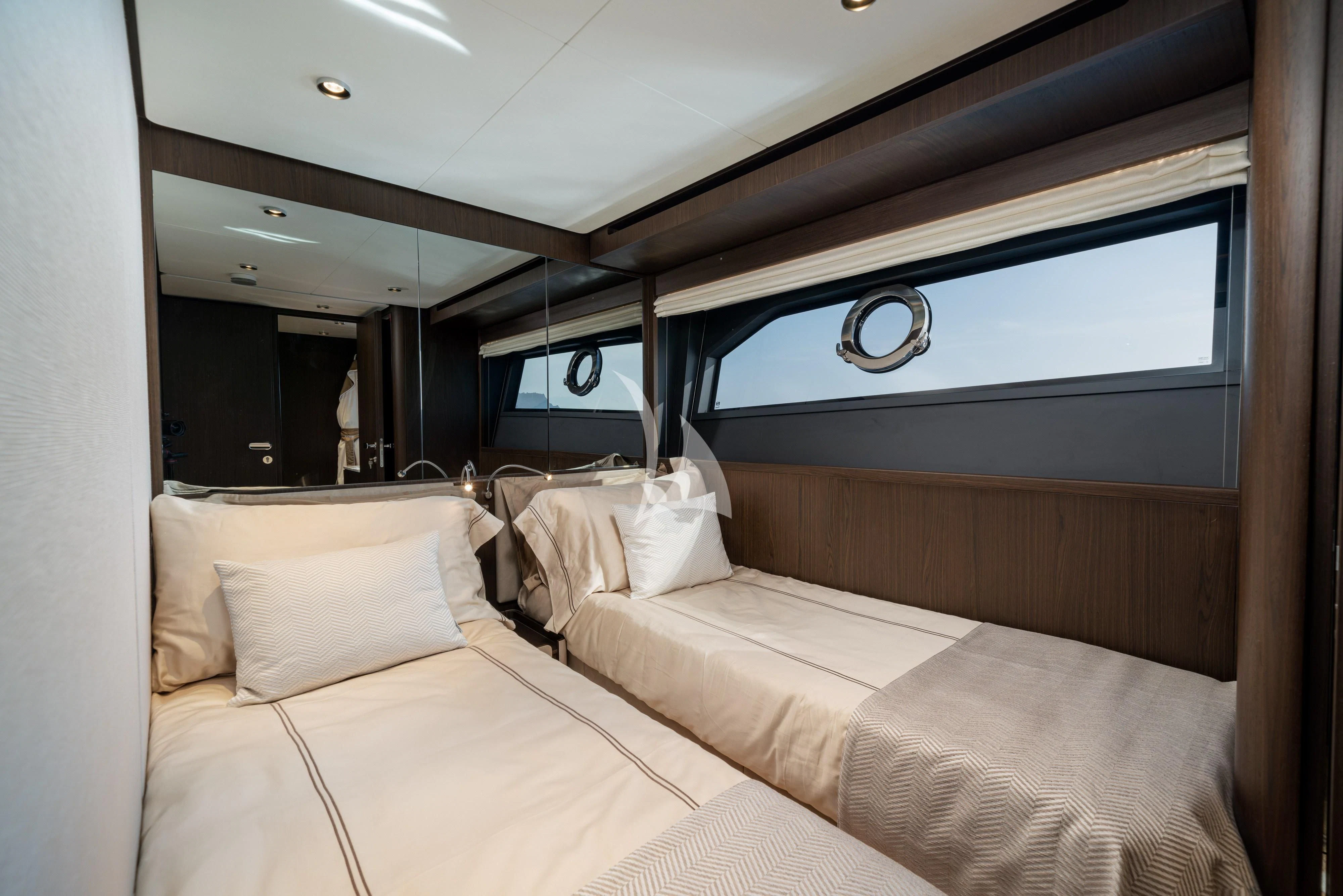 a room with a bed and a window aboard VITTORIA Yacht for Sale