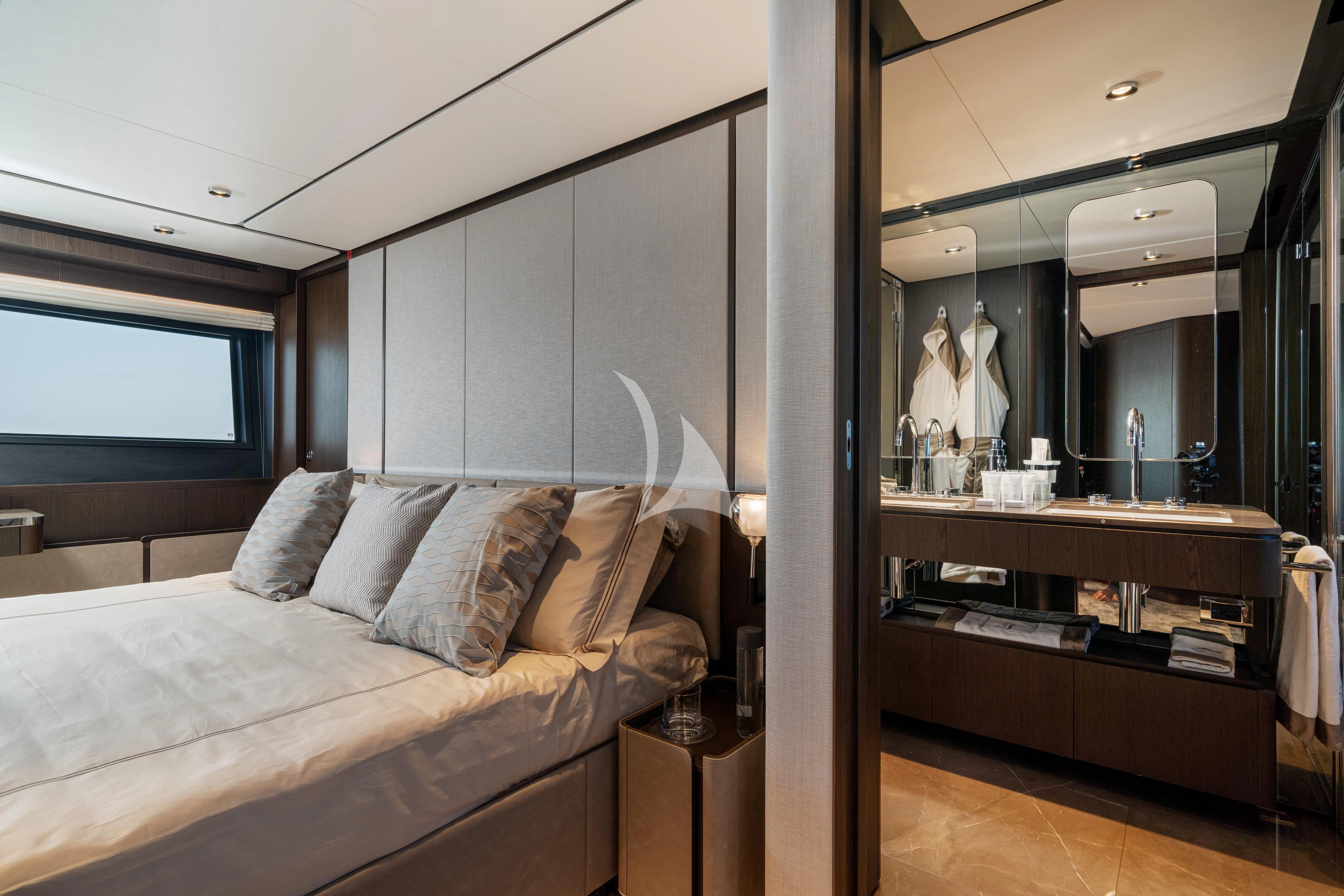 a living room with a couch and a mirror aboard VITTORIA Yacht for Sale