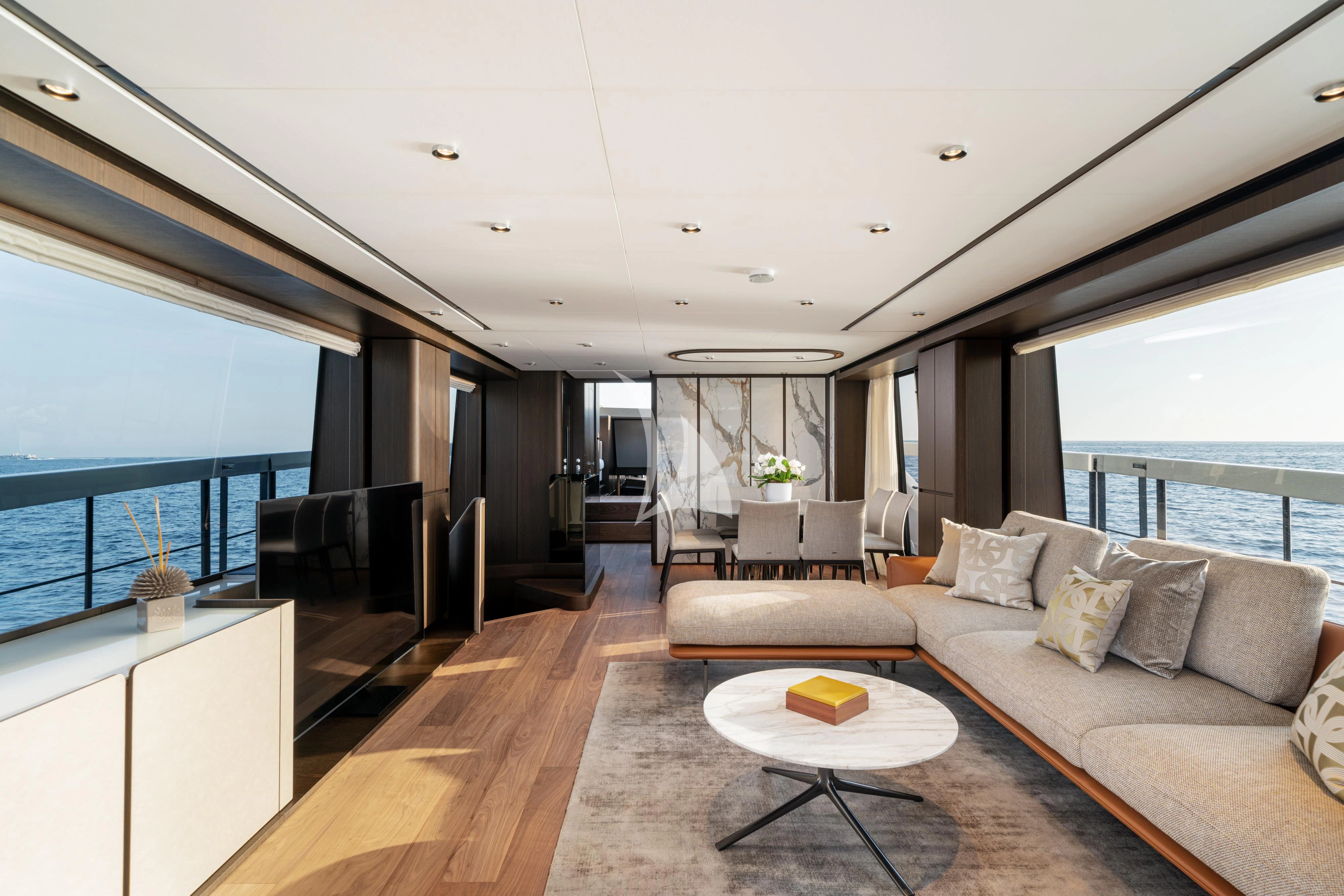 a living room with a large window aboard VITTORIA Yacht for Sale