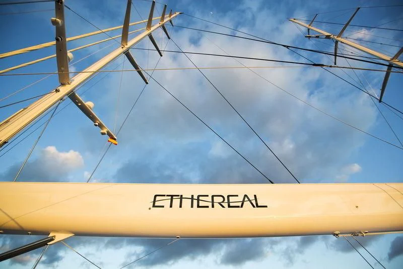 a yellow metal frame with a white sign on it aboard ETHEREAL Yacht for Sale