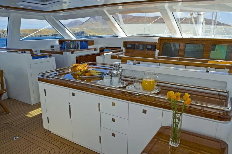 a kitchen with white cabinets aboard ETHEREAL Yacht for Sale
