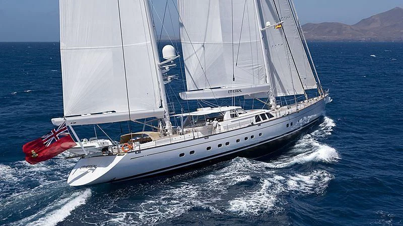 a white boat on the water aboard ETHEREAL Yacht for Sale