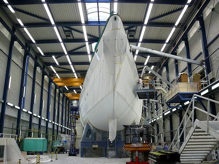 a large white shark in a large room with other objects aboard ETHEREAL Yacht for Sale