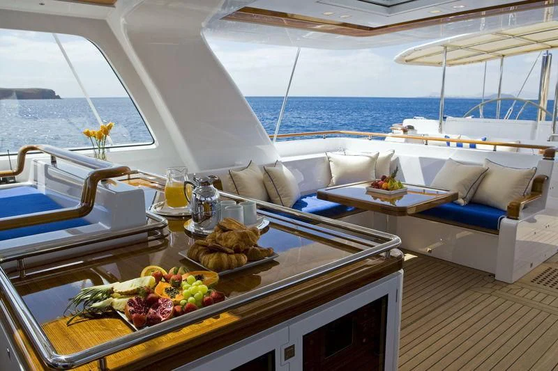 a table with food on it aboard ETHEREAL Yacht for Sale
