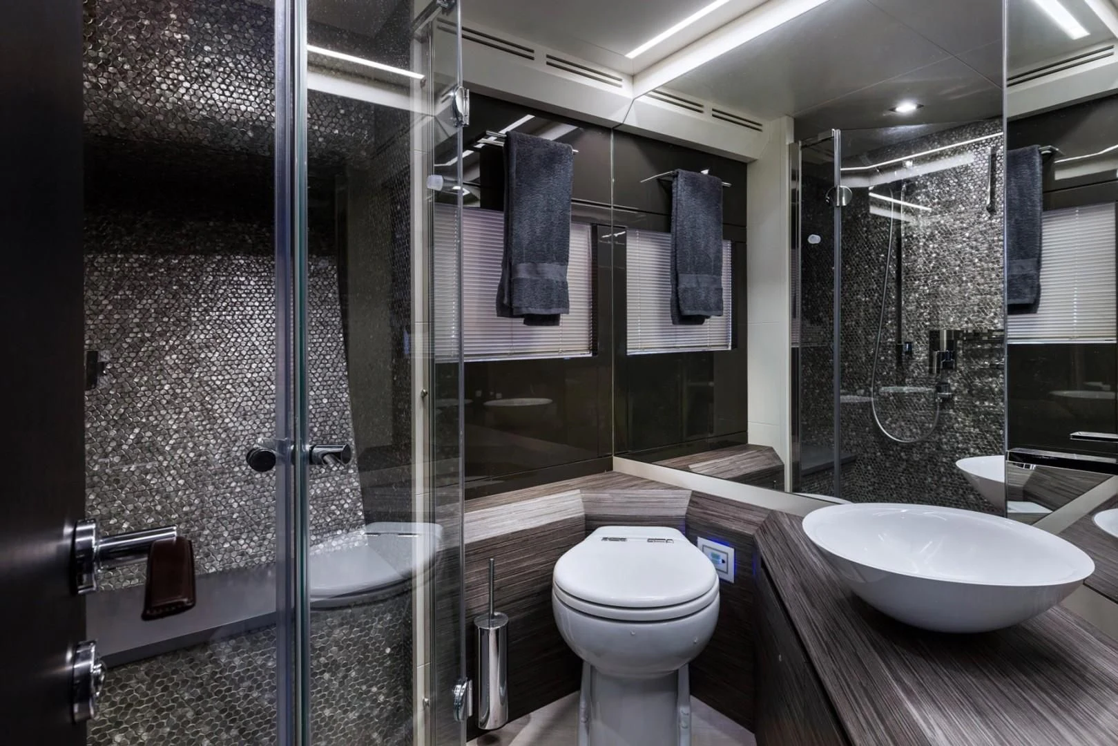 a bathroom with a glass shower aboard AFRICAN WILD DOG Yacht for Sale