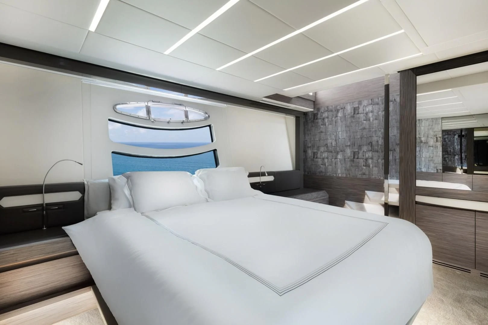 a room with a bed and a large window aboard AFRICAN WILD DOG Yacht for Sale