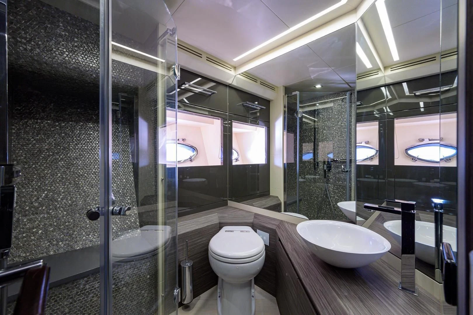 a bathroom with a glass shower aboard AFRICAN WILD DOG Yacht for Sale