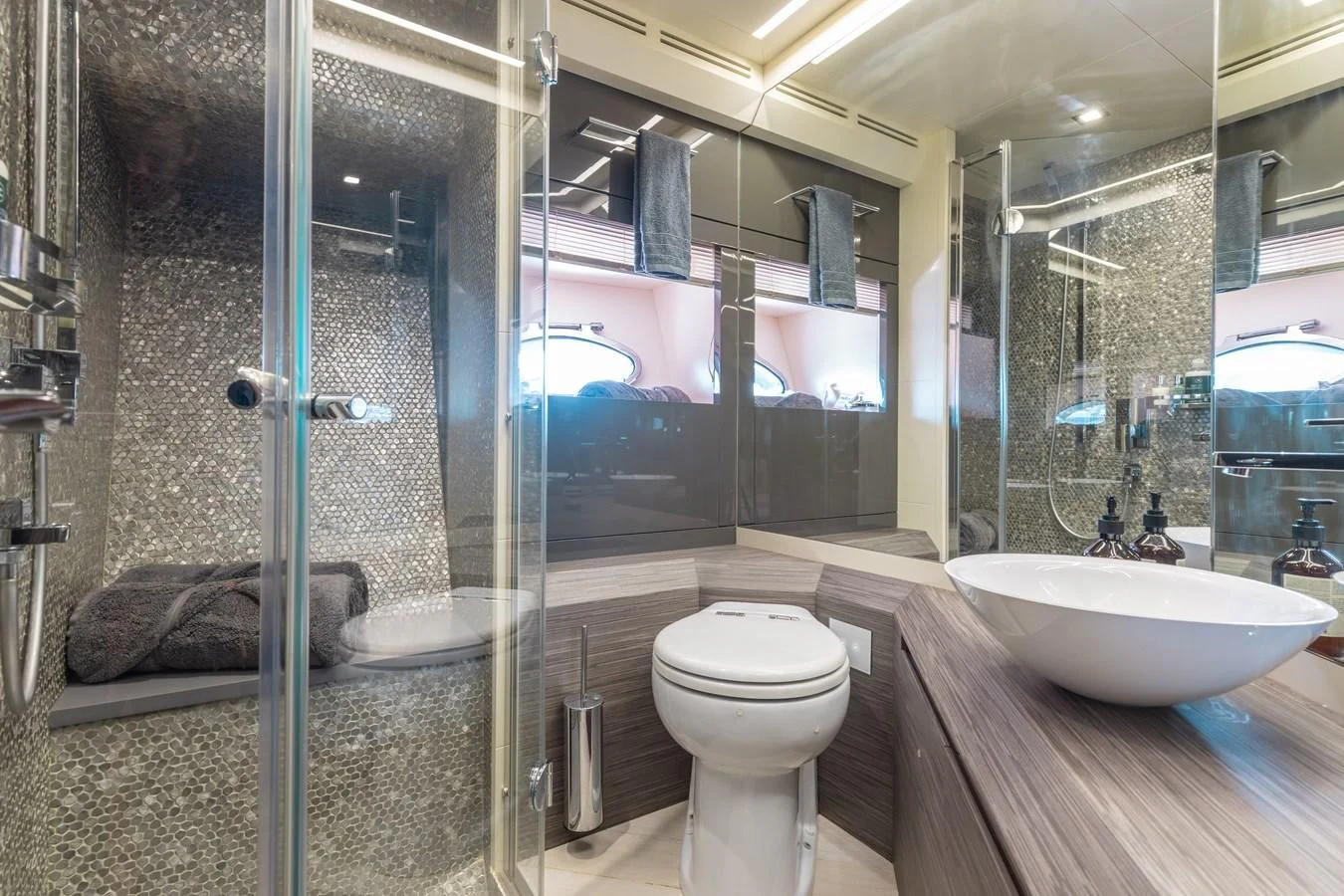 a bathroom with a glass shower aboard AFRICAN WILD DOG Yacht for Sale