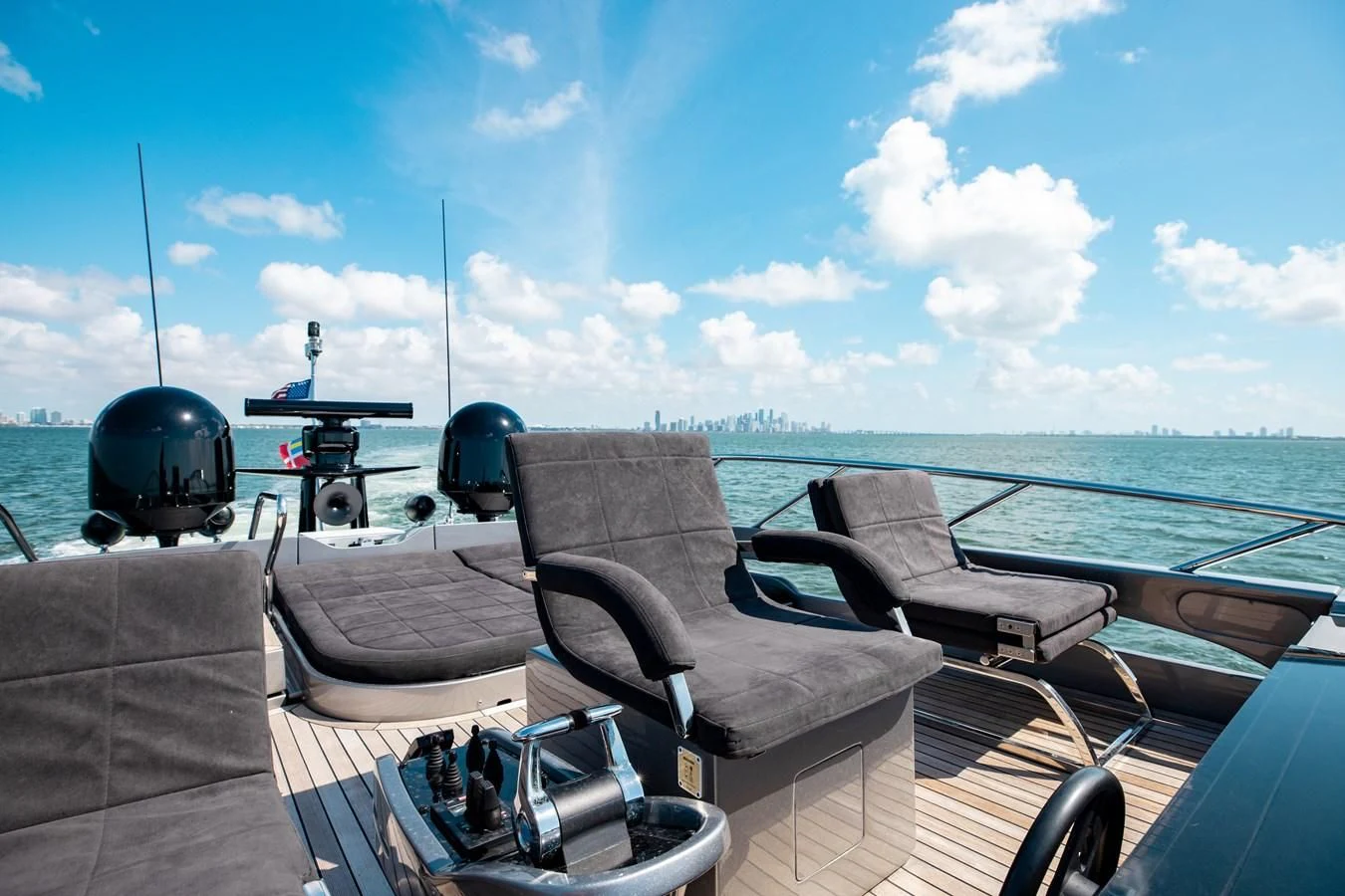 a boat with chairs on it aboard AFRICAN WILD DOG Yacht for Sale