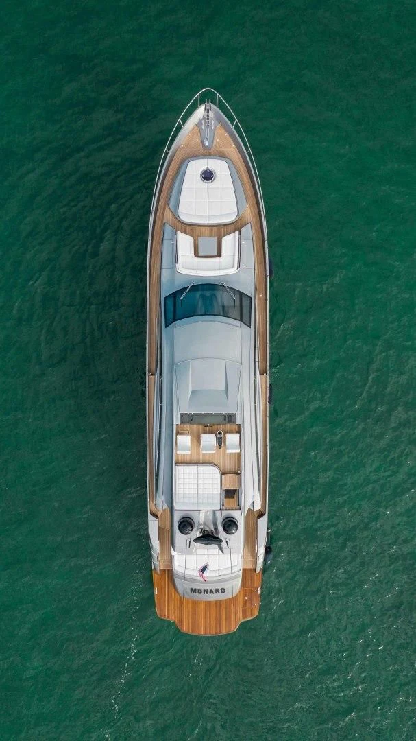 a small wooden boat on a body of water aboard AFRICAN WILD DOG Yacht for Sale