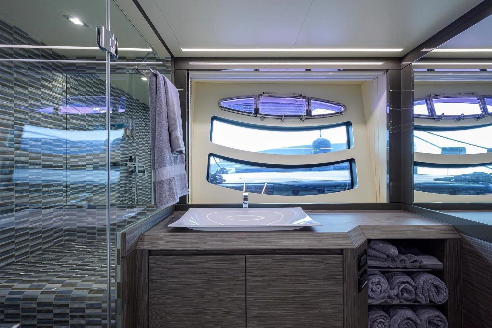 a room with a large mirror aboard AFRICAN WILD DOG Yacht for Sale