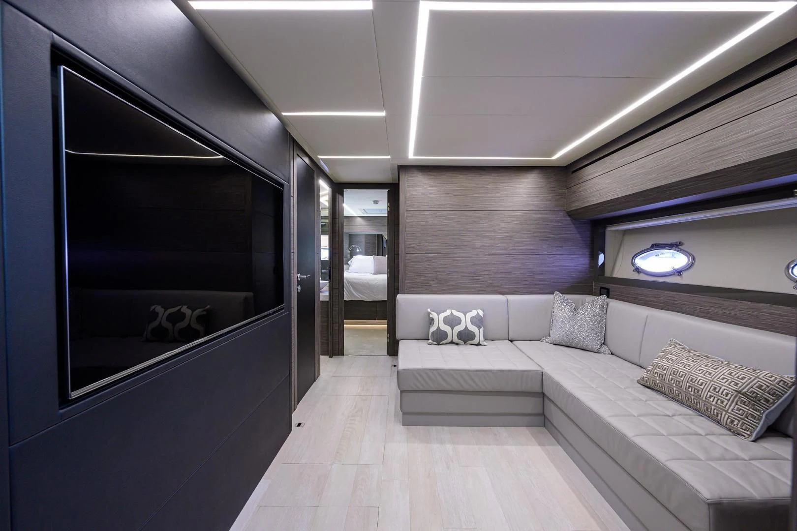 a room with a bed and a couch aboard AFRICAN WILD DOG Yacht for Sale