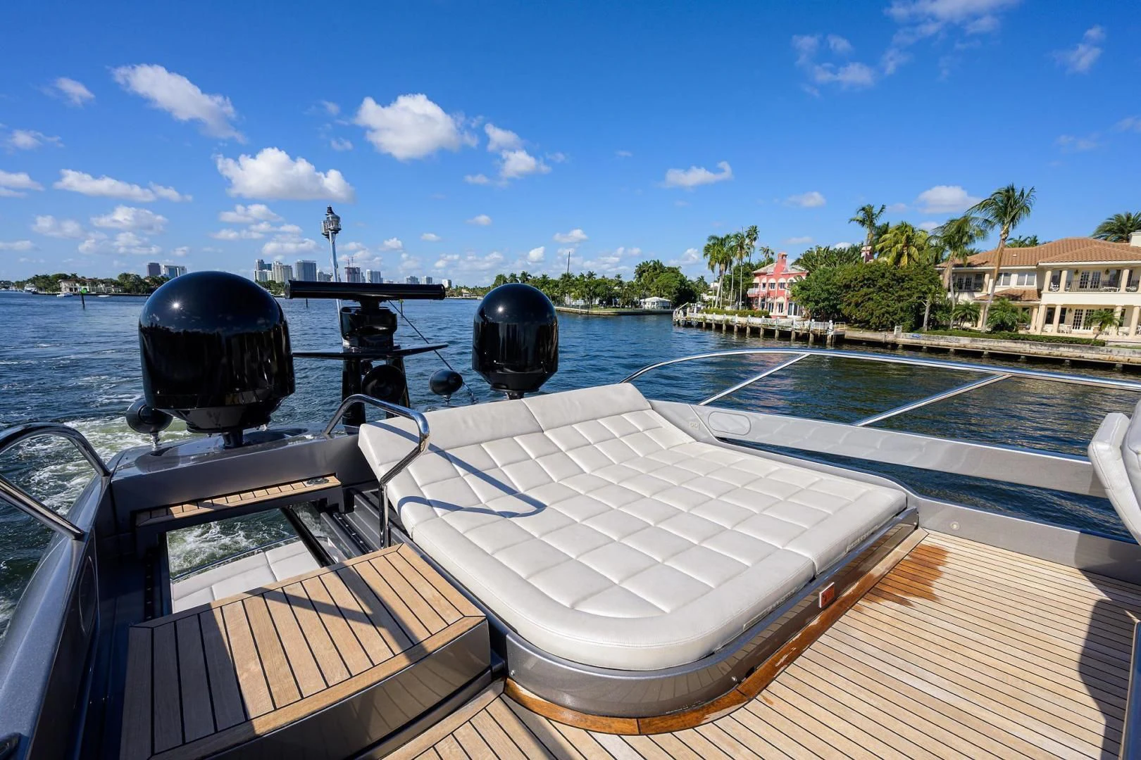a deck with a large black ball on it and a black barrel on it aboard AFRICAN WILD DOG Yacht for Sale