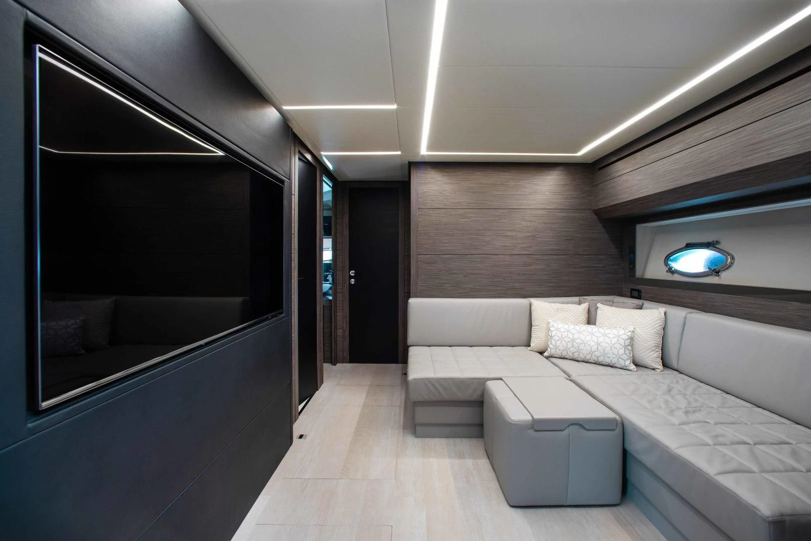 a room with a bed and a window aboard AFRICAN WILD DOG Yacht for Sale
