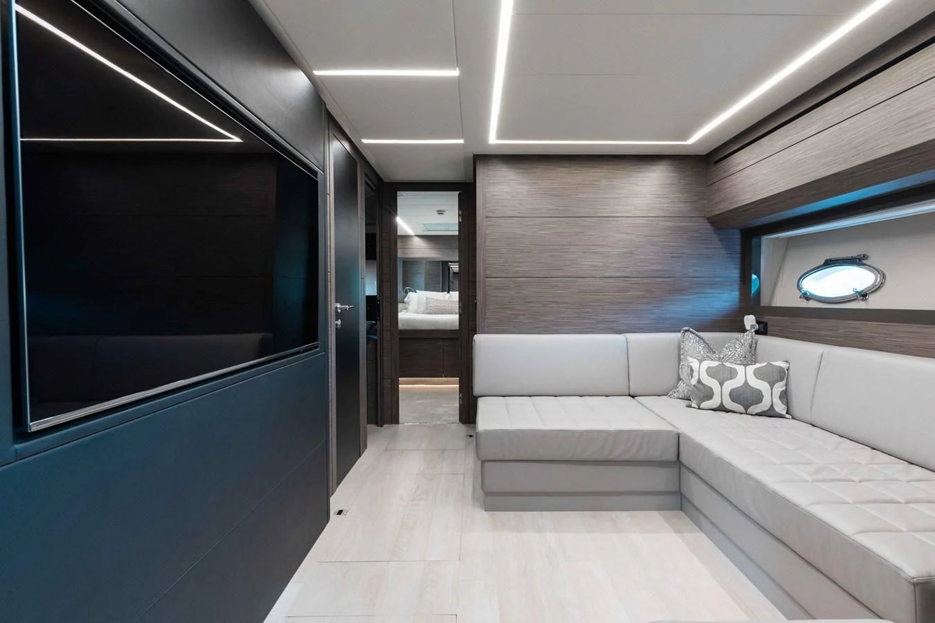 a room with a bed and a window aboard AFRICAN WILD DOG Yacht for Sale