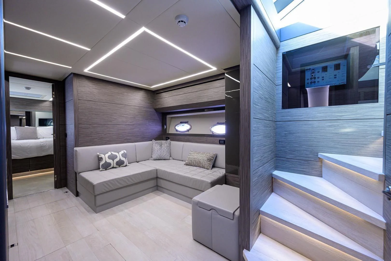 a room with a bed and a couch aboard AFRICAN WILD DOG Yacht for Sale
