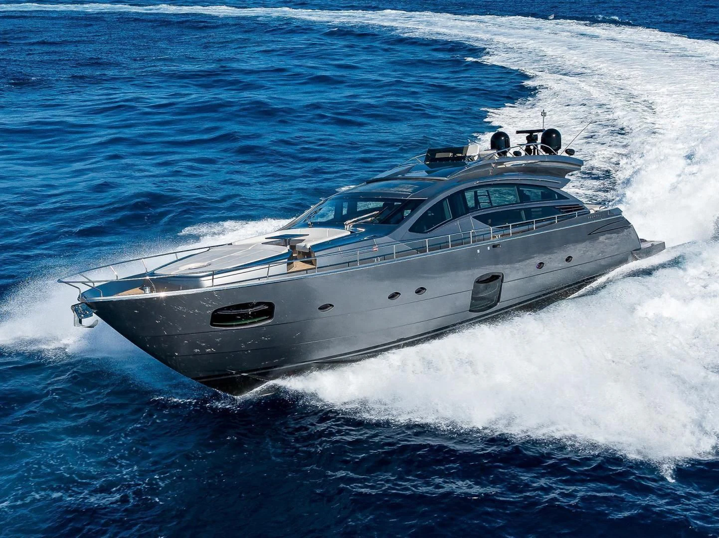 a white yacht in the water aboard AFRICAN WILD DOG Yacht for Sale