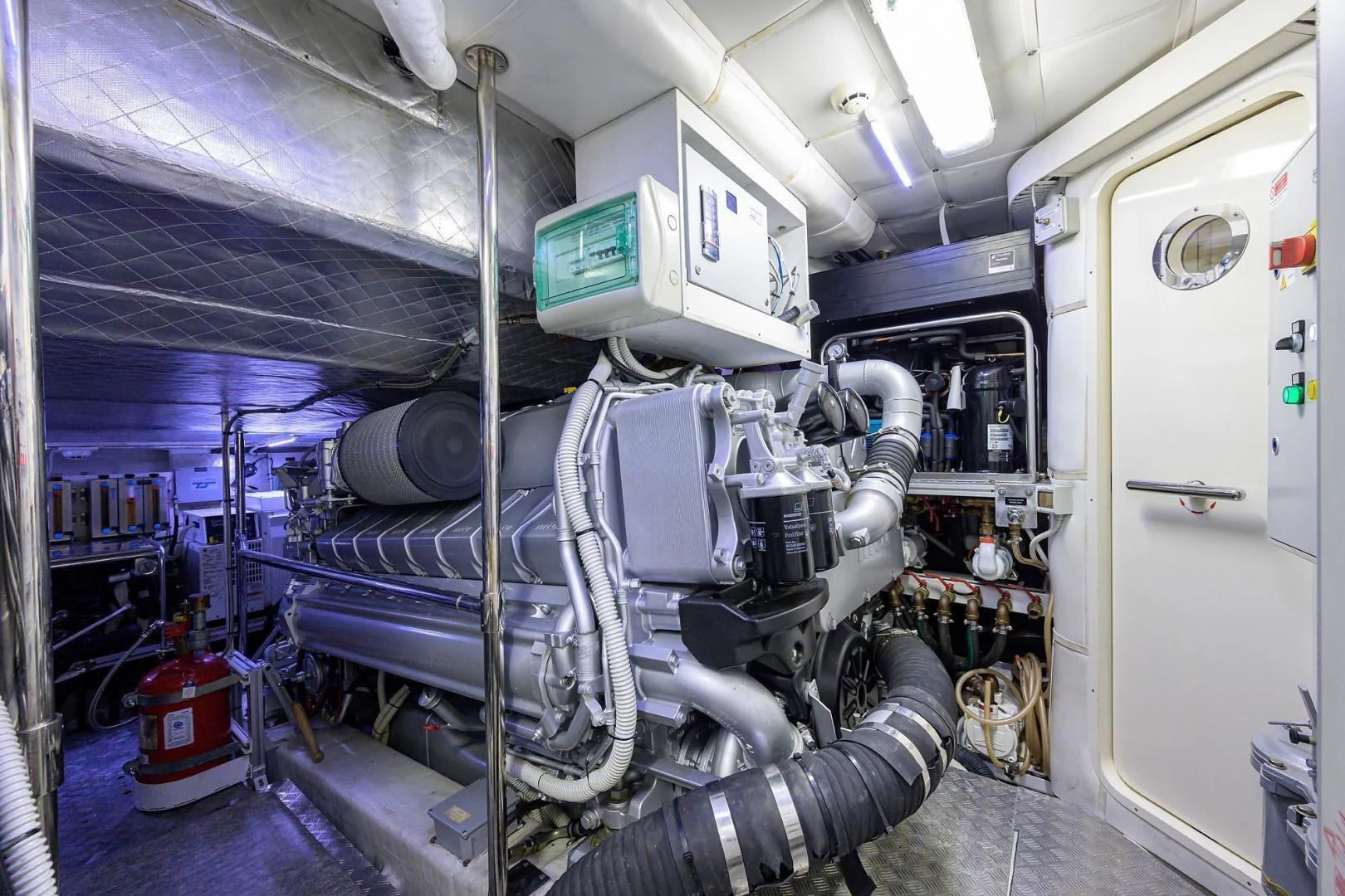 a machine in a room aboard AFRICAN WILD DOG Yacht for Sale