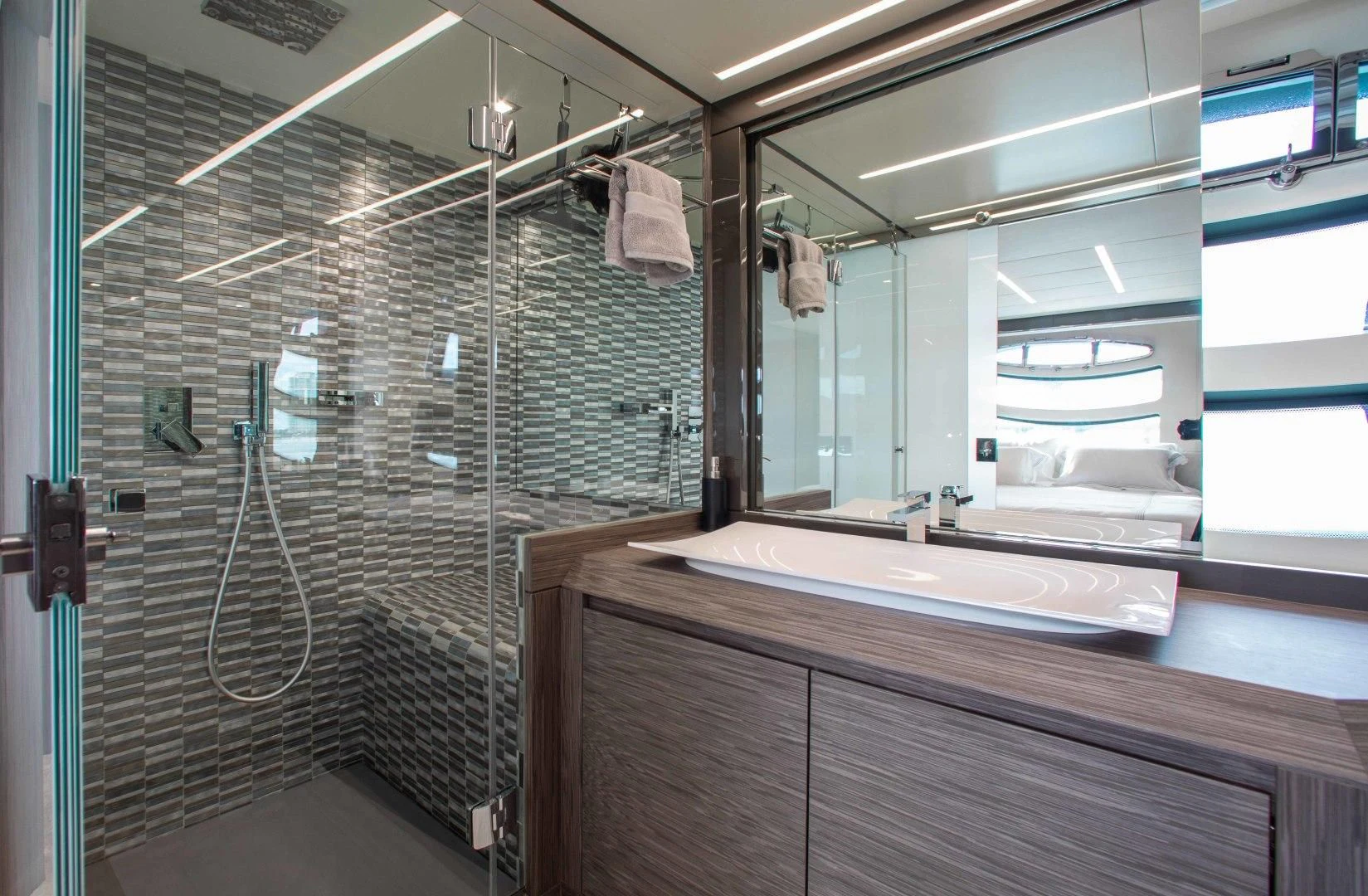 a bathroom with a glass shower aboard AFRICAN WILD DOG Yacht for Sale
