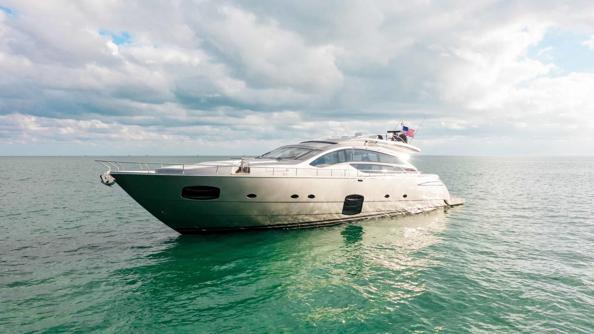 a white boat in the water aboard AFRICAN WILD DOG Yacht for Sale