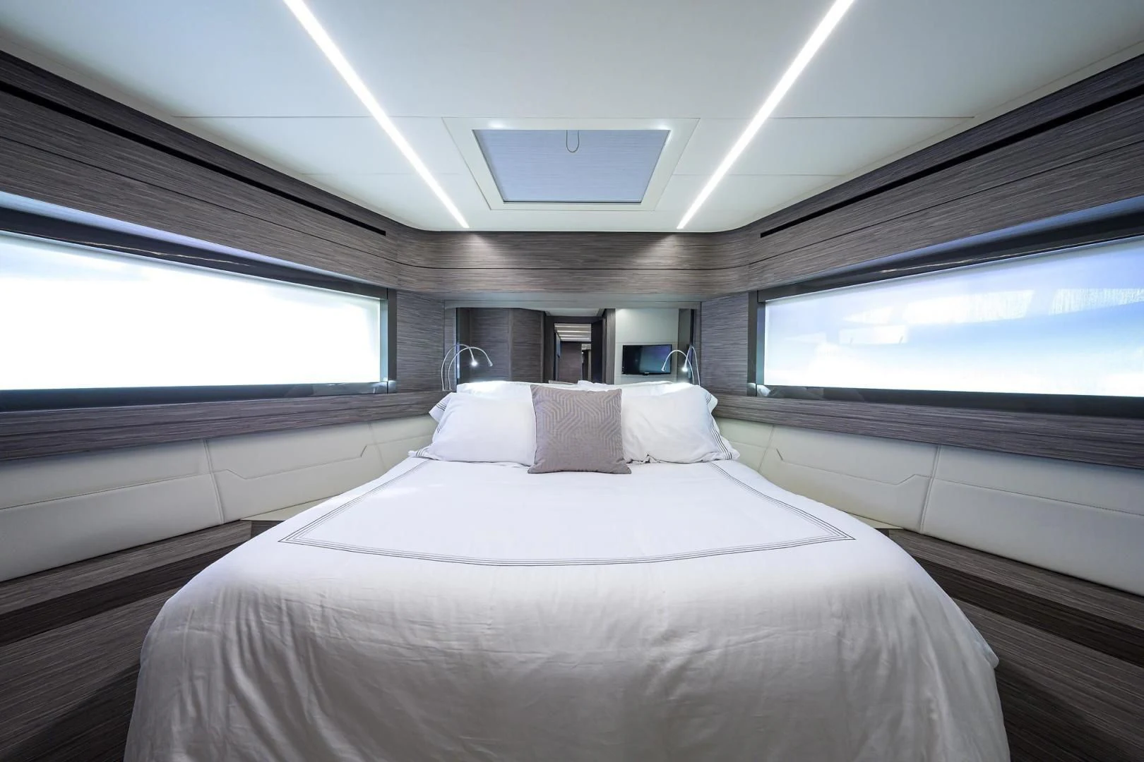 a bed in a room aboard AFRICAN WILD DOG Yacht for Sale